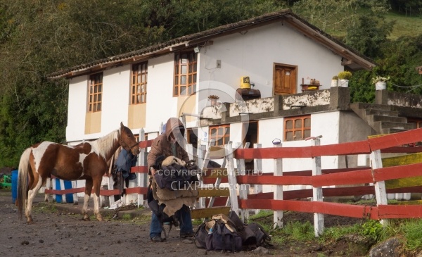 Jorge gets the horses ready at Hosteria San Jose  in Sigchos, Ec
